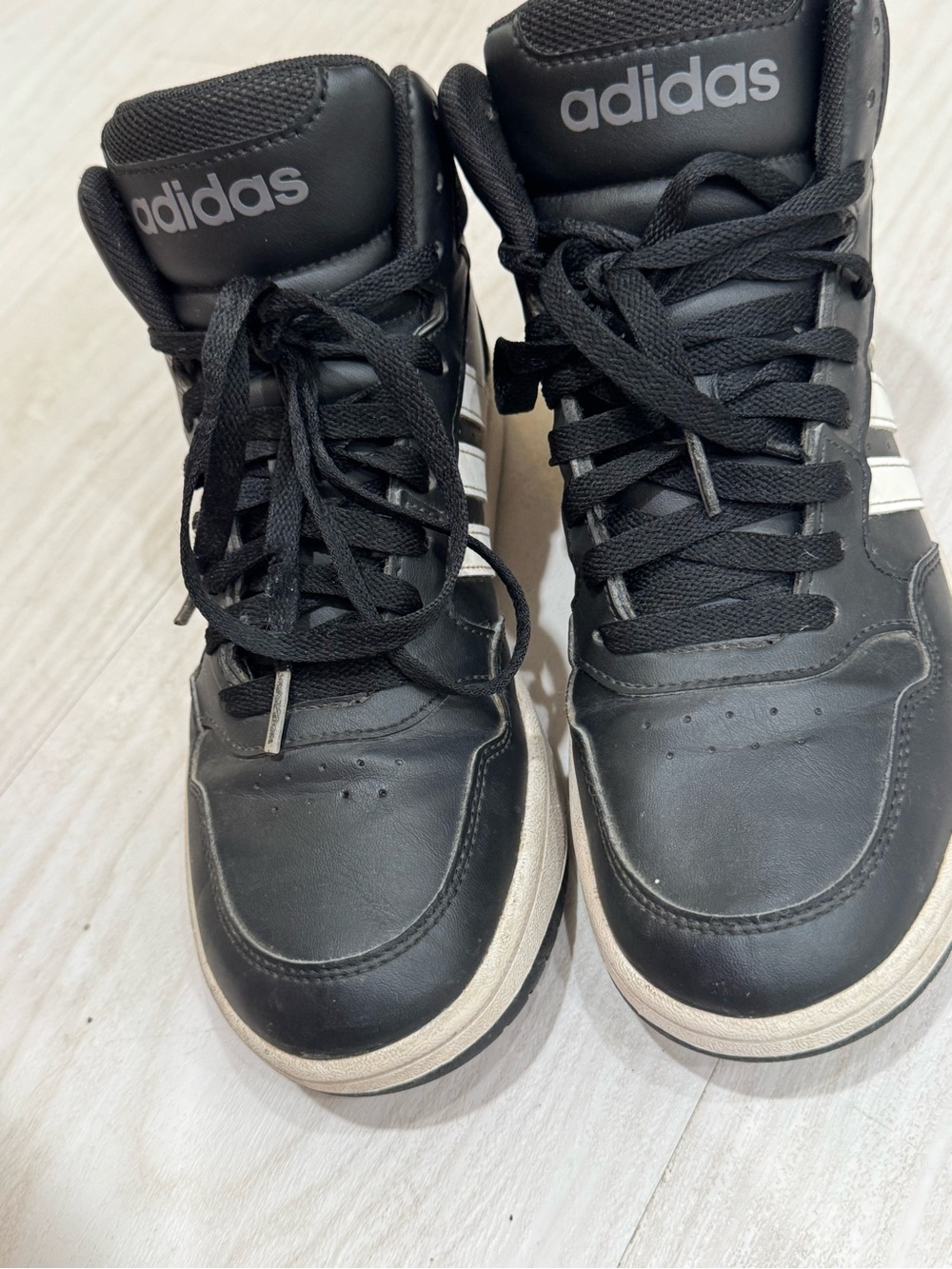 adidas Black High-Top Sneakers with White Stripes and Cream Soles